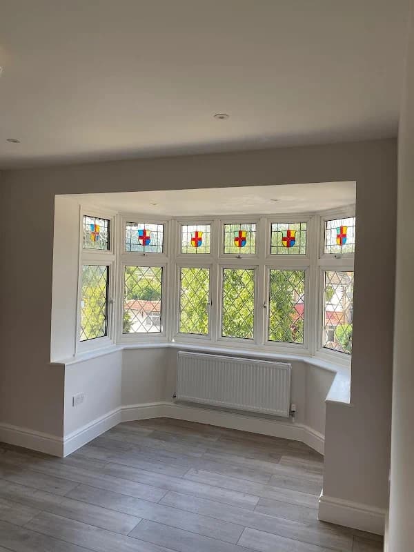Loft conversion with Velux skylights and white walls