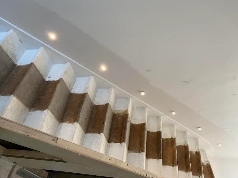 Contemporary staircase with glass balustrade